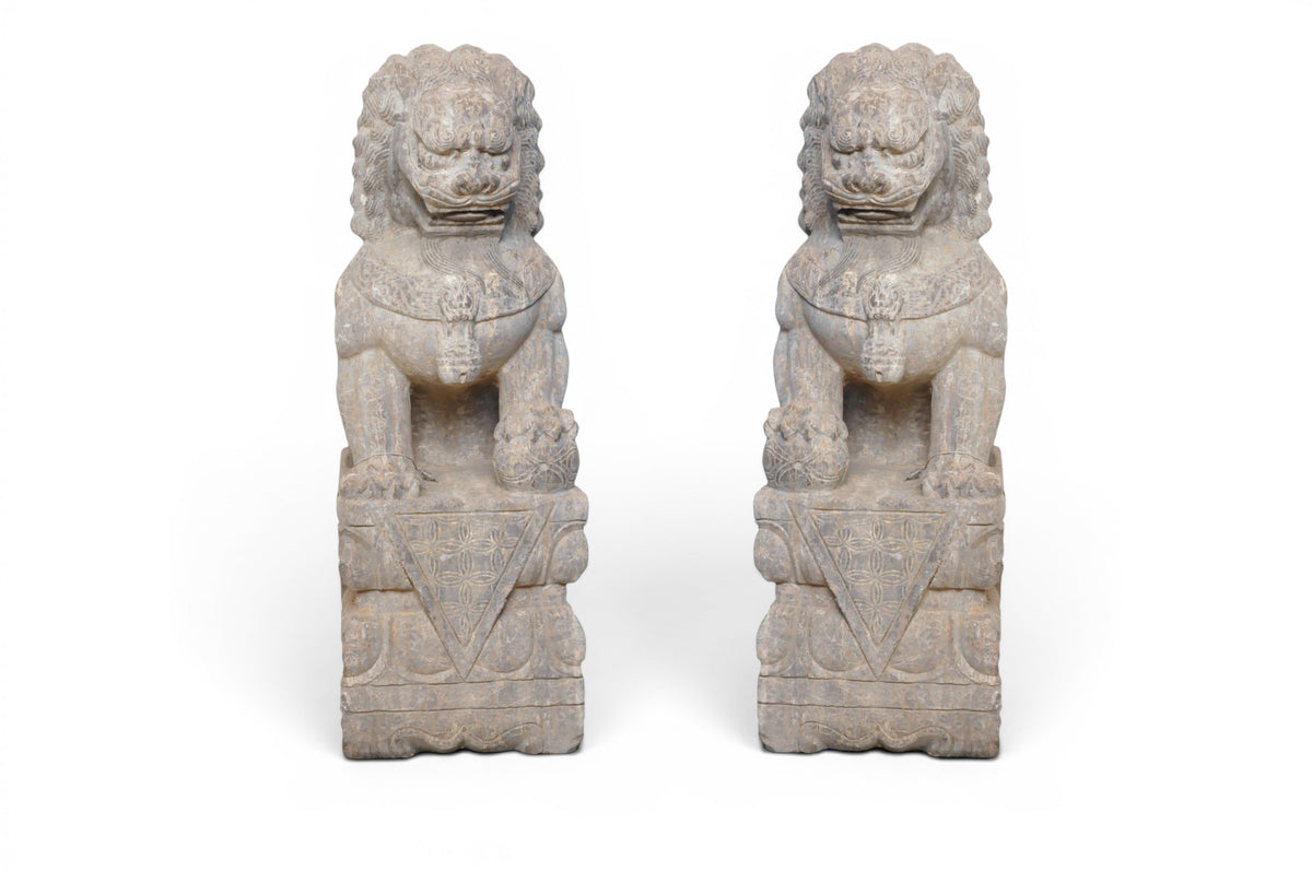 A Pair of Carved Stone Fu dogs