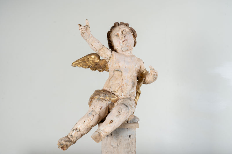 A Cherub Carved From Wood With Polychrome & Gilt