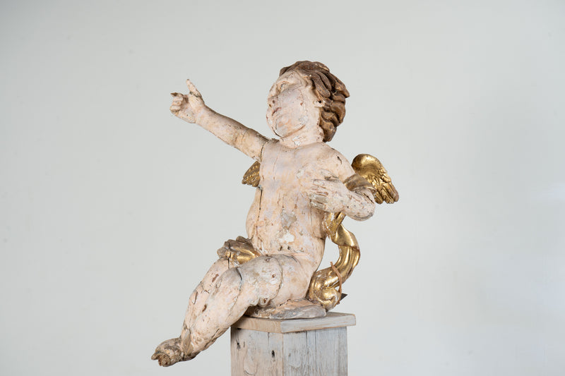 A Cherub Carved From Wood With Polychrome & Gilt