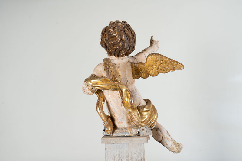 A Cherub Carved From Wood With Polychrome & Gilt
