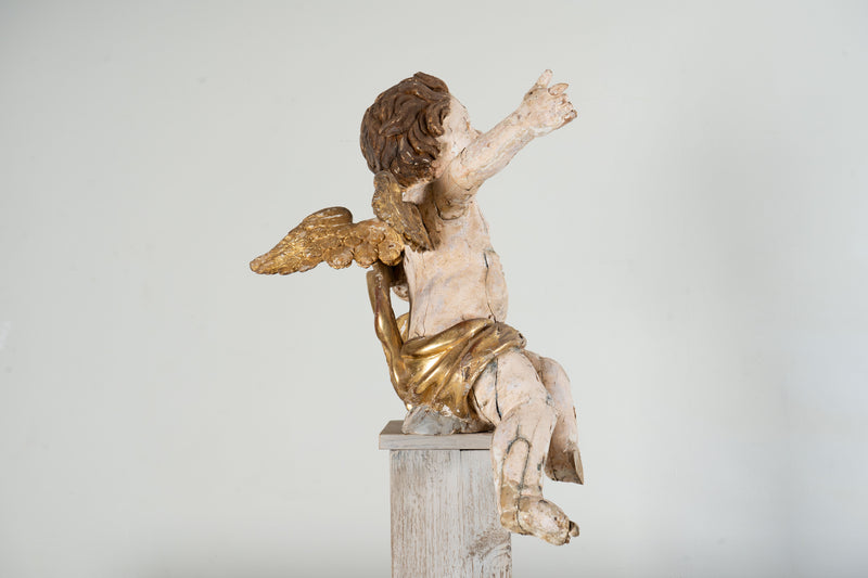 A Cherub Carved From Wood With Polychrome & Gilt