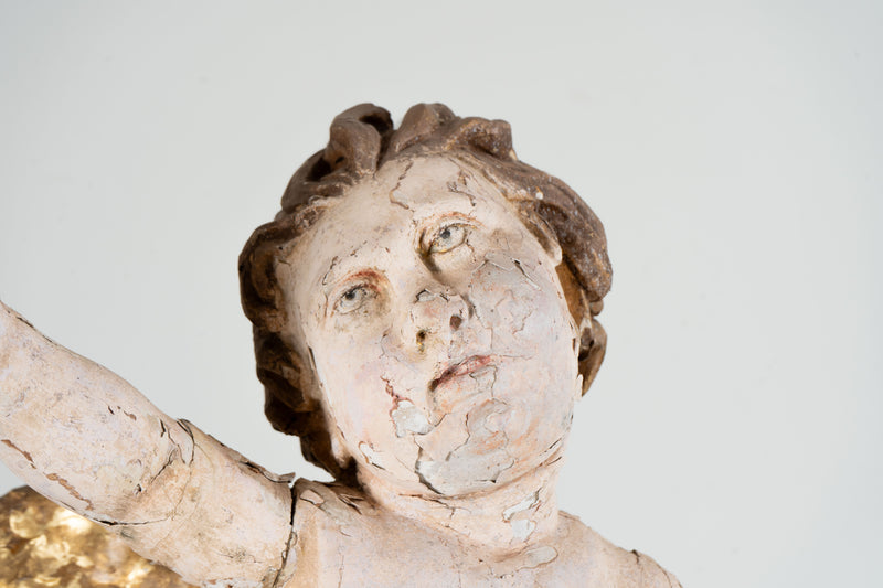 A Cherub Carved From Wood With Polychrome & Gilt