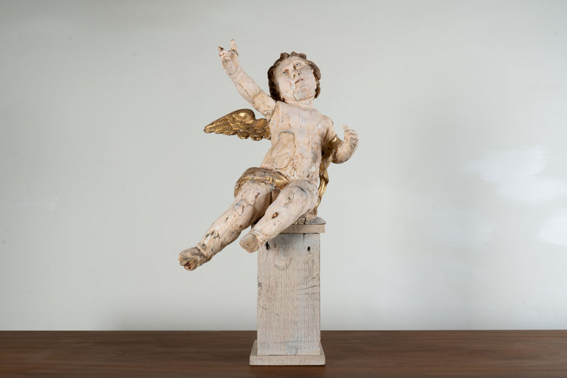 A Cherub Carved From Wood With Polychrome & Gilt