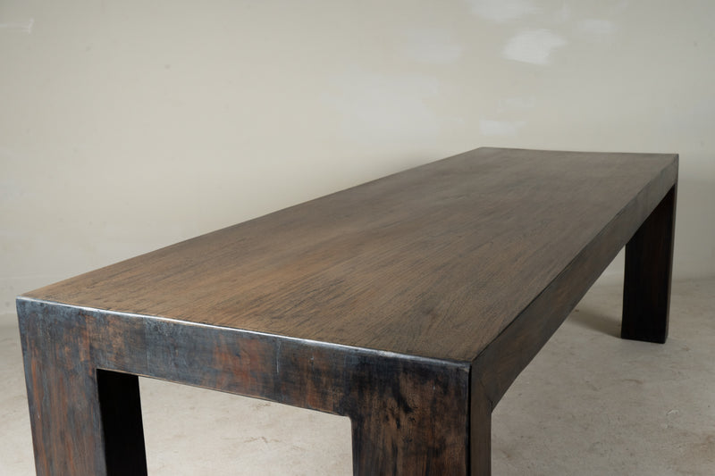 A Monumental Teakwood Dining Table