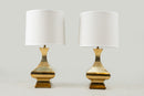 A Pair of Art Deco Brass Lamps