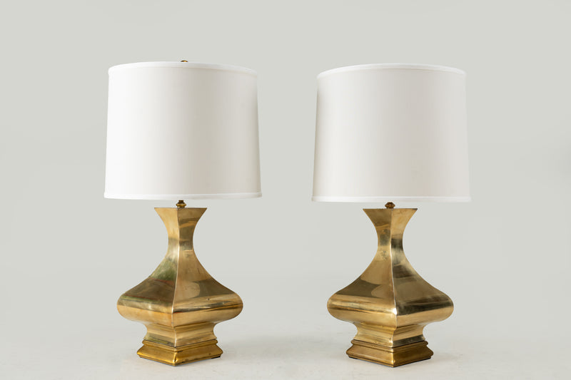 A Pair of Art Deco Brass Lamps