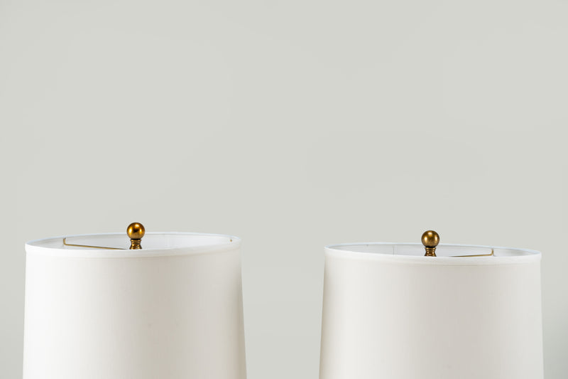 A Pair of Art Deco Brass Lamps