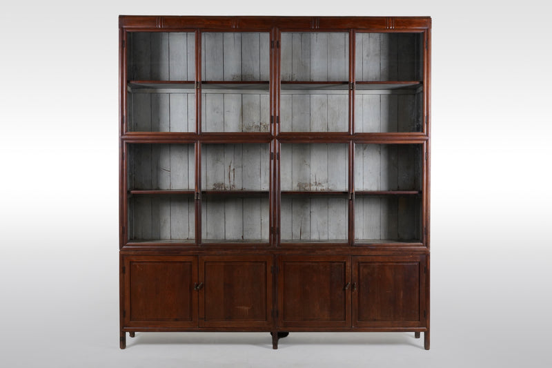 A British Colonial Teak Wood Bookcase with Bottom Storage