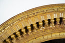 A Carved Mango Wood Round Mirror Frame
