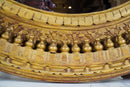 A Carved Mango Wood Round Mirror Frame