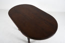A Teak Wood Oval Dining Table