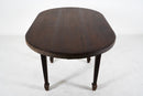 A Teak Wood Oval Dining Table
