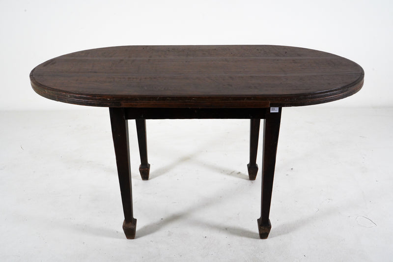 A Teak Wood Oval Dining Table