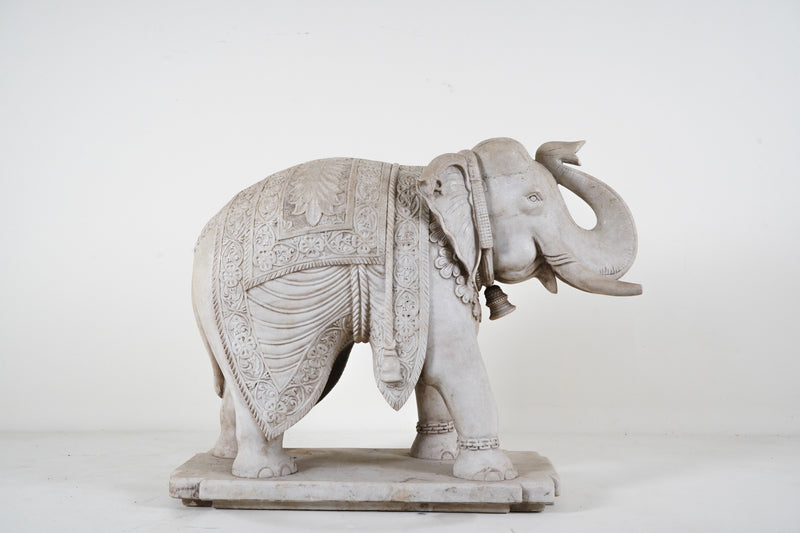 A Monumental Pair of Carved Marble Elephants
