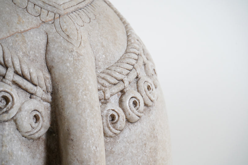 A Monumental Pair of Carved Marble Elephants