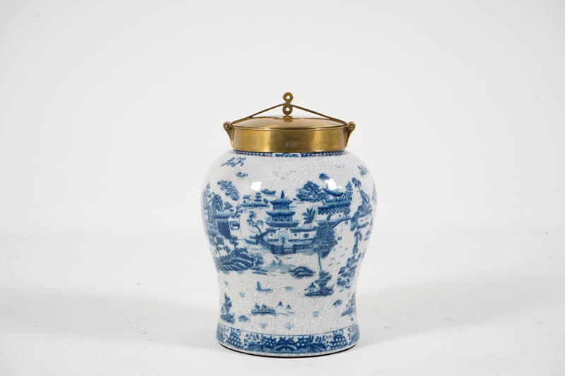 A Blue & White Porcelain Jar with a Bronze Cap