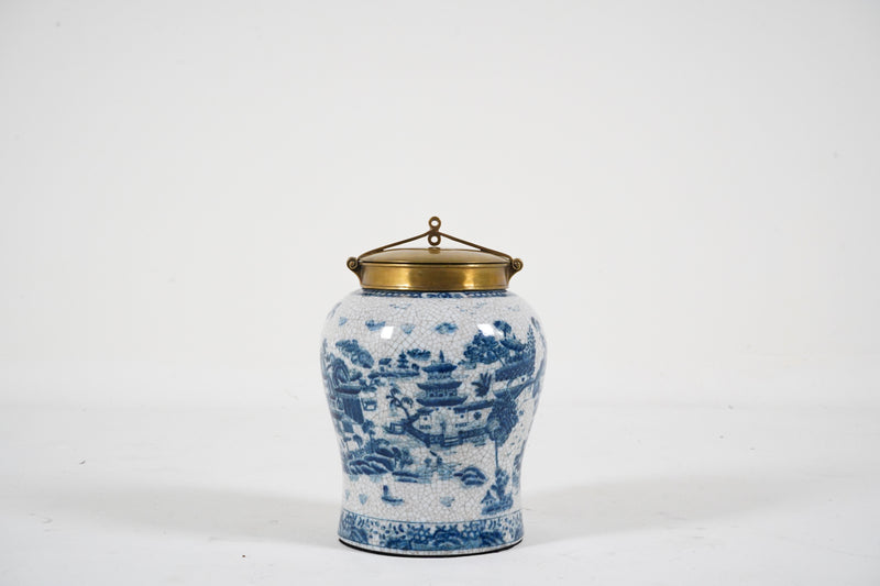 A Blue & White Porcelain Jar with a Bronze Cap