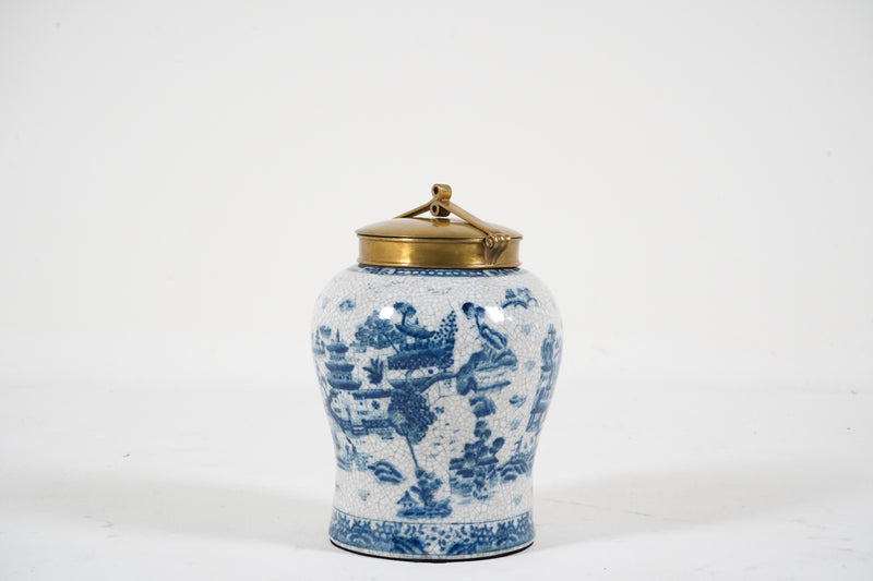 A Blue & White Porcelain Jar with a Bronze Cap