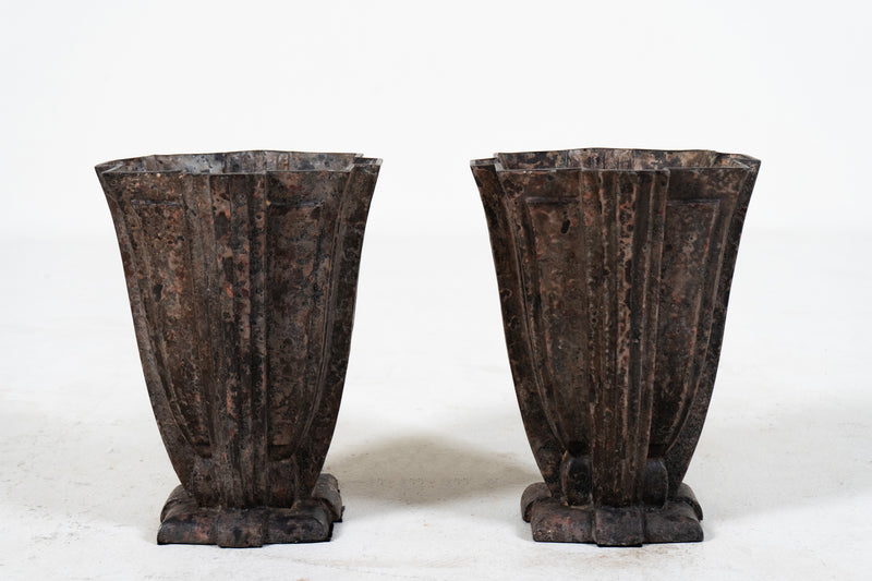 A Pair of Cast Iron Art Deco Urns