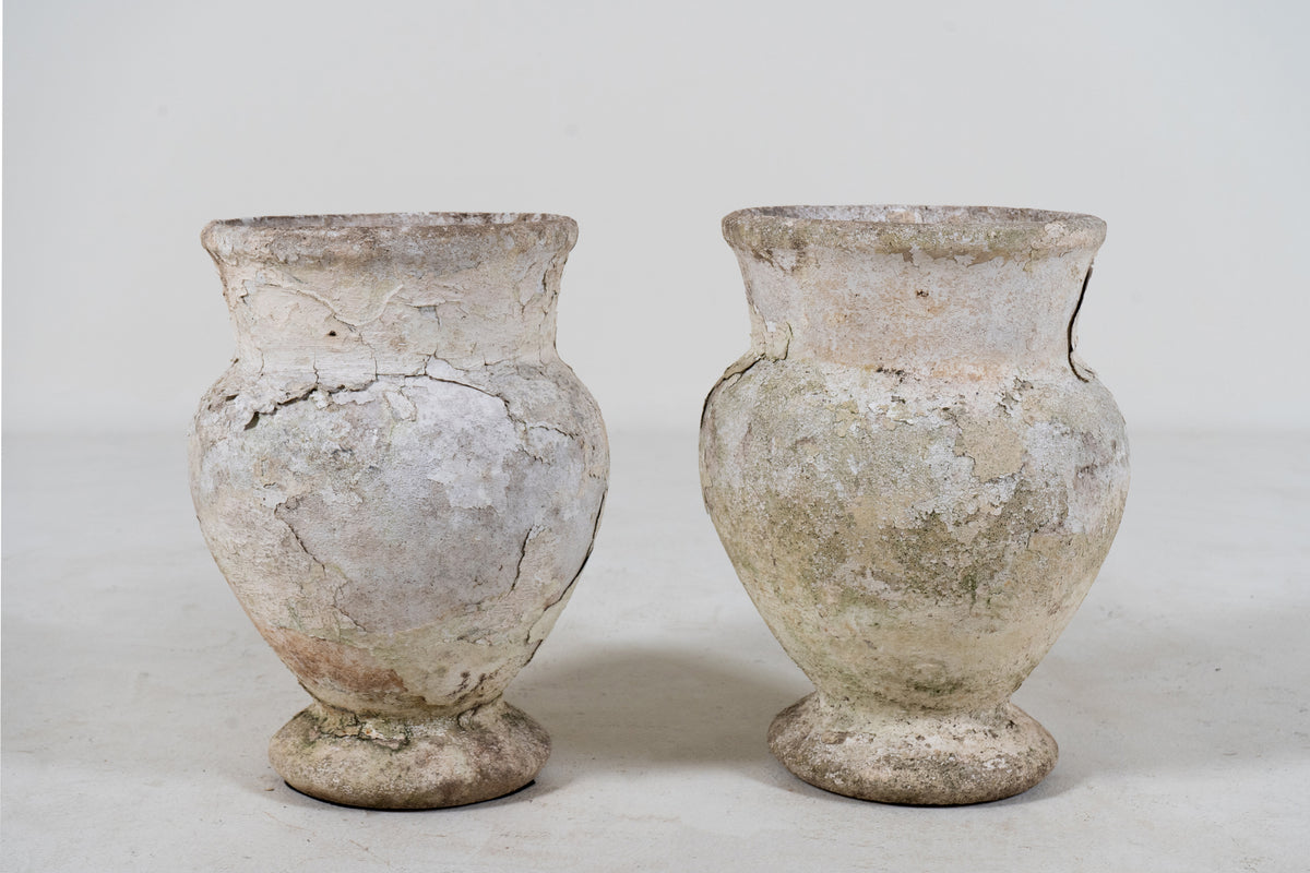 A Pair of White Cement Urns
