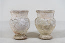 A Pair of White Cement Urns