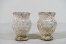 A Pair of White Cement Urns