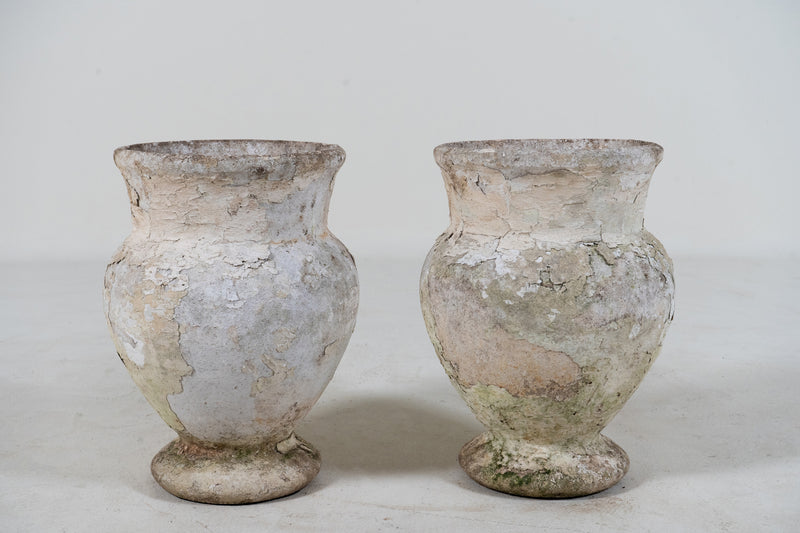 A Pair of White Cement Urns