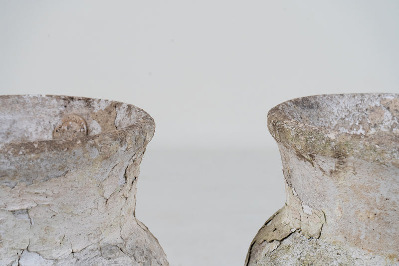 A Pair of White Cement Urns