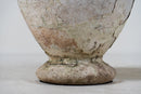 A Pair of White Cement Urns