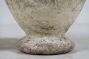 A Pair of White Cement Urns