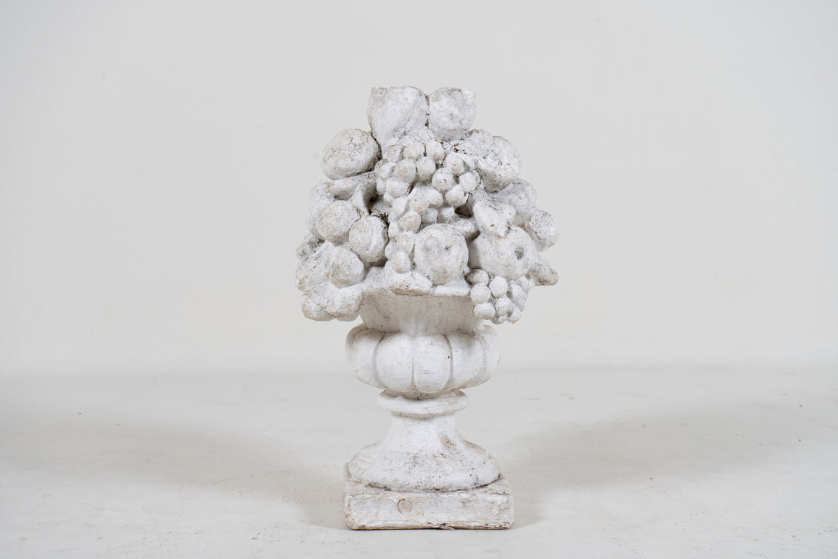 A Cement Urn in The Form of a Fruit Cluster