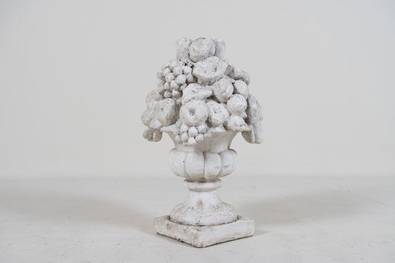 A Cement Urn in The Form of a Fruit Cluster