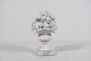 A Cement Urn in The Form of a Fruit Cluster