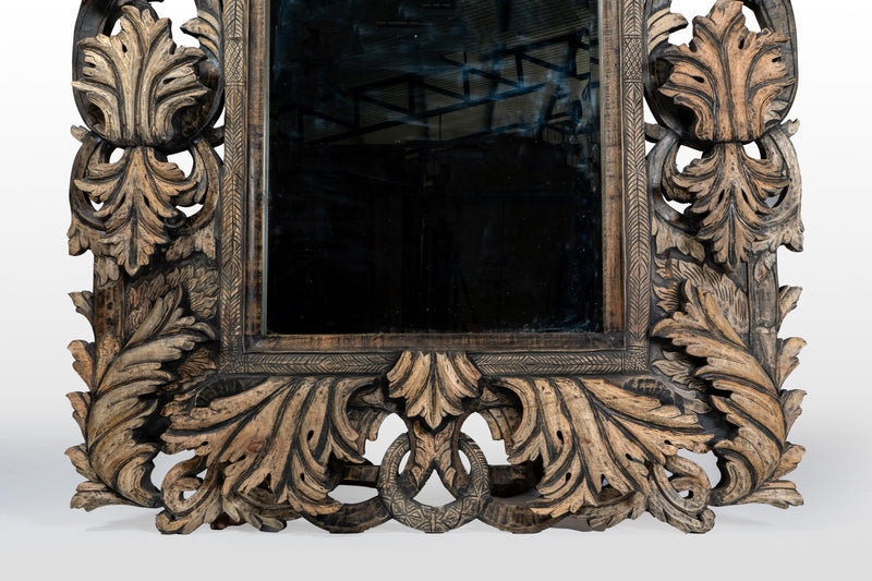 A Hand-Carved Indian Mirror Frame