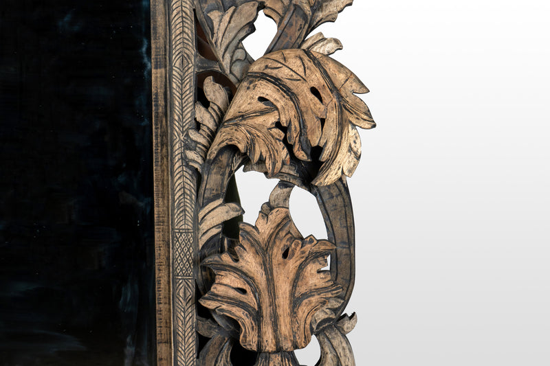 A Hand-Carved Indian Mirror Frame