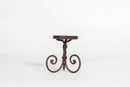A Set of 3 Twisted Iron Candle Holders
