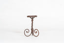 A Set of 3 Twisted Iron Candle Holders