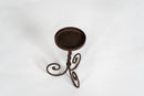 A Set of 3 Twisted Iron Candle Holders