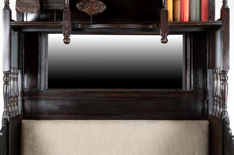 A Hallway Bench with Mirror and Shelving