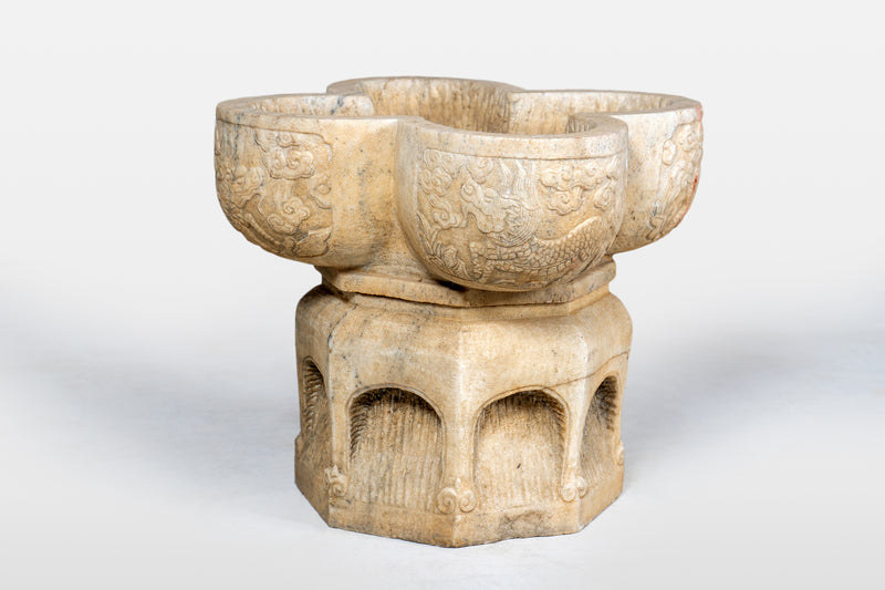 A Raised Marble Lotus Shaped Basin