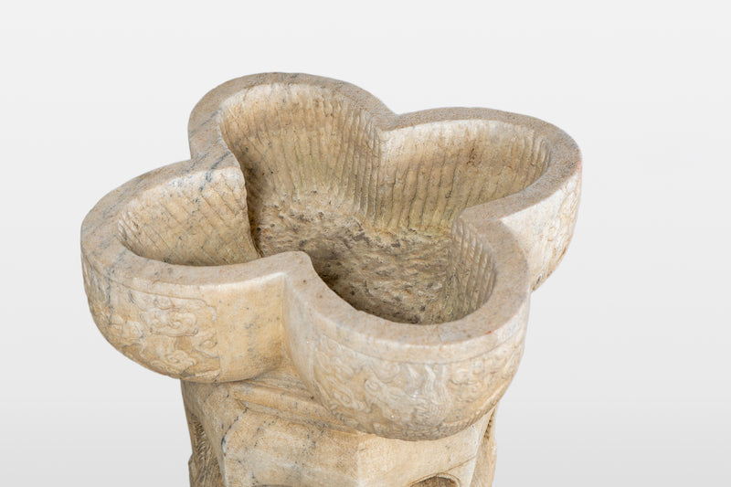 A Raised Marble Lotus Shaped Basin