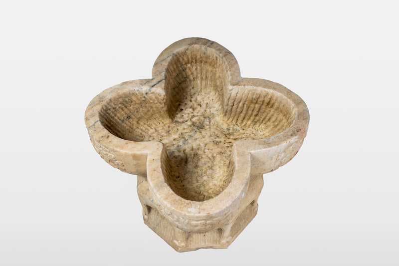 A Raised Marble Lotus Shaped Basin