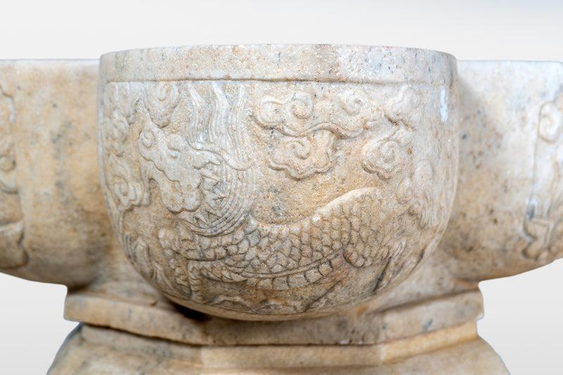 A Raised Marble Lotus Shaped Basin