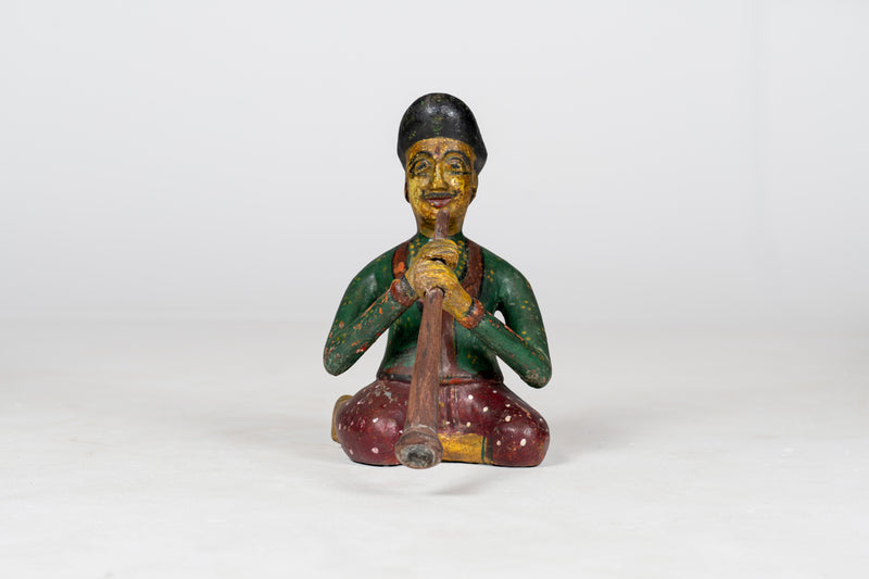 Small Wooden Figure of Musician Playing Shehnai