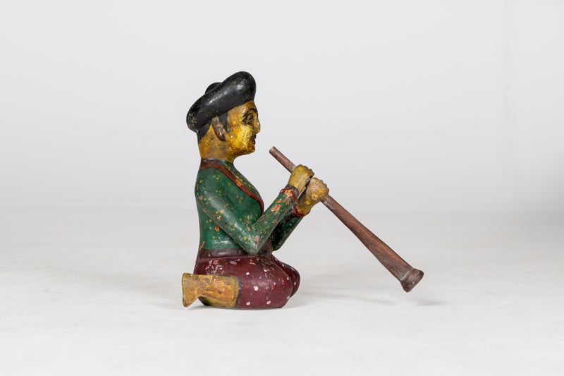 Small Wooden Figure of Musician Playing Shehnai
