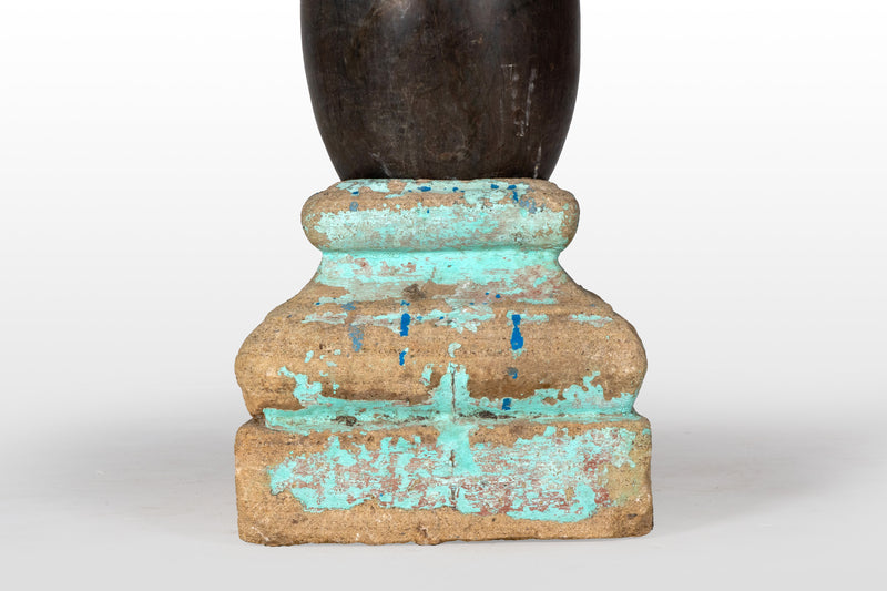 An Aniconic Lingam on a Stone Base