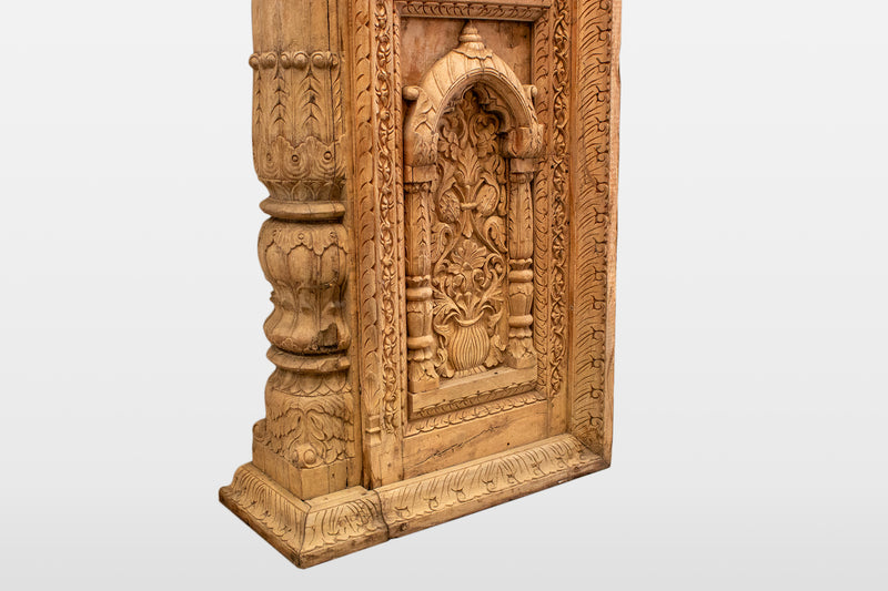 A Wooden Indian Colonnade With Five Arches and Candle Alcoves