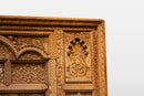 A Wooden Indian Colonnade With Five Arches and Candle Alcoves