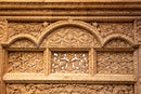A Wooden Indian Colonnade With Five Arches and Candle Alcoves