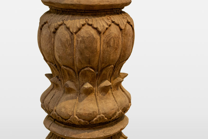 A Wooden Indian Colonnade With Five Arches and Candle Alcoves